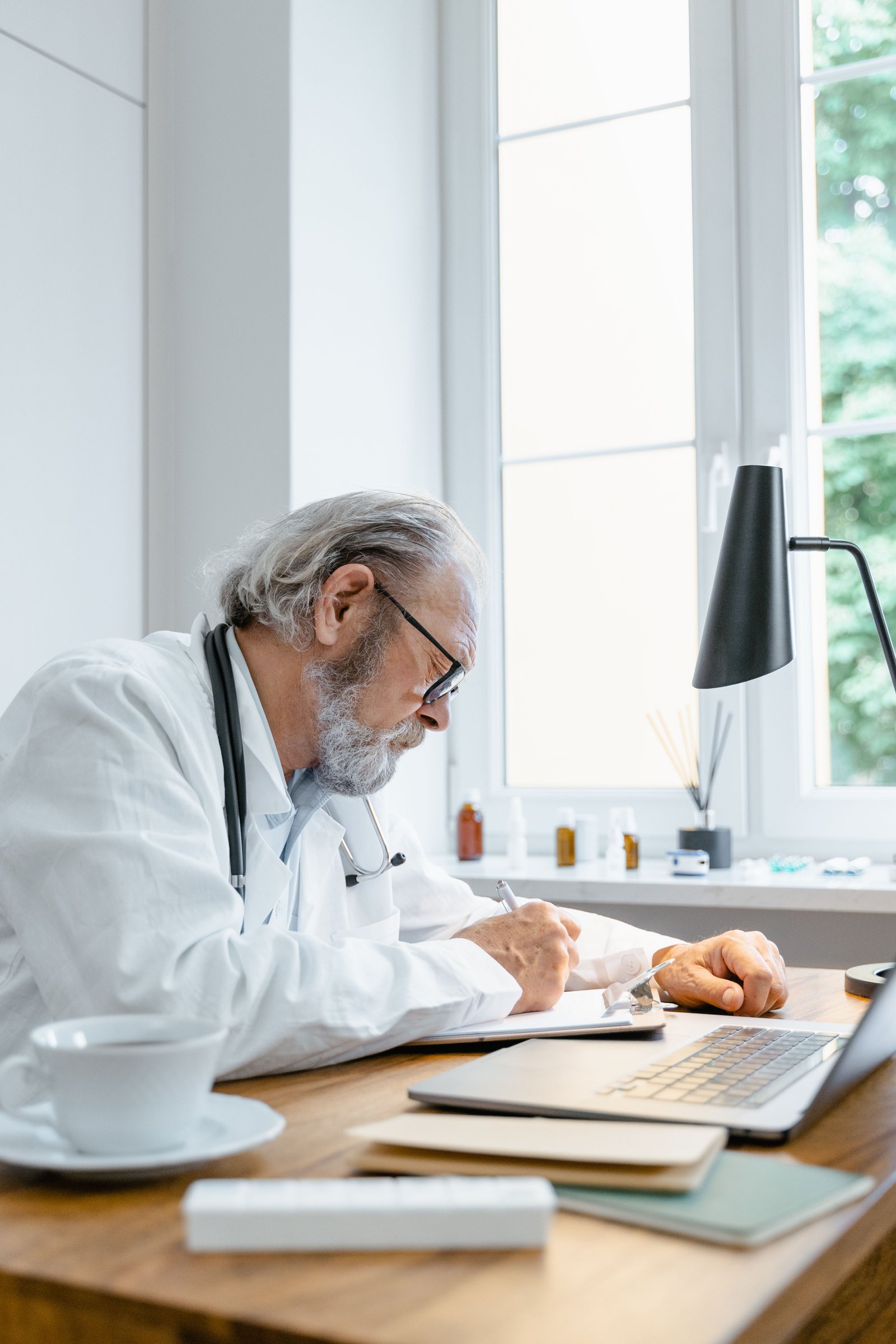 Doctor reviewing billing documents